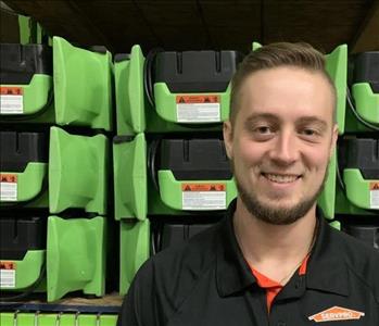 Scott, contents claims manager, pictured in our warehouse 